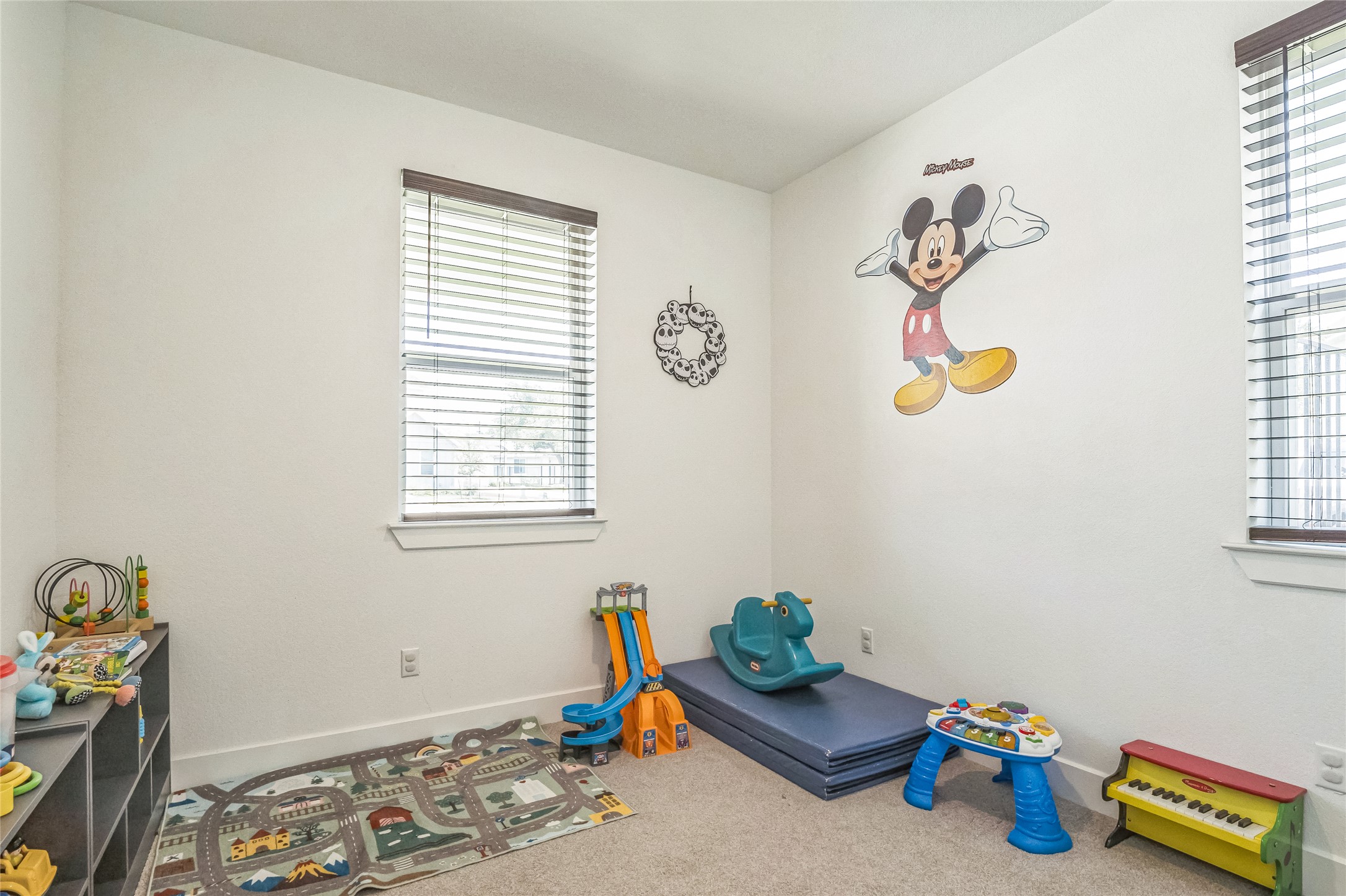3706 Mesquite Vly Road Georgetown, TX 78628 - Photo 13 of 30 Playroom with carpet floors and baseboards