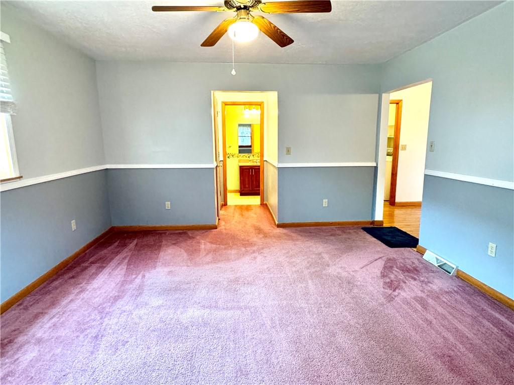 569 Whitestown Road Butler, PA 16001 - Photo 17 of 47 a view of a room with window and wooden floor