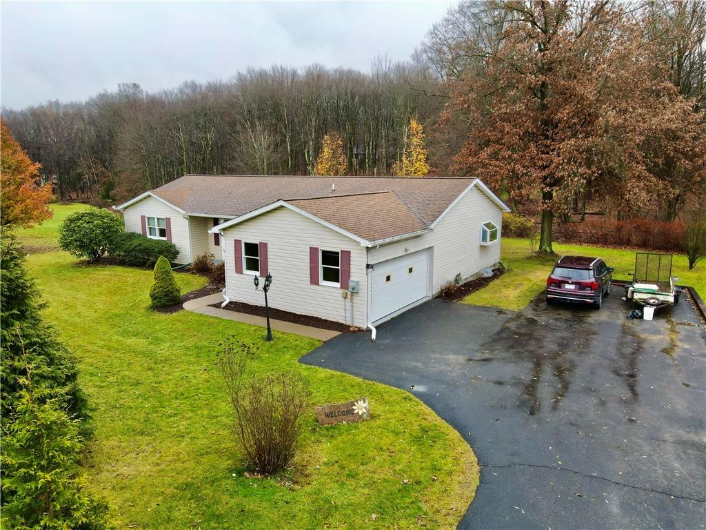 569 Whitestown Road Butler, PA 16001 - Photo 2 of 47 a view of a house with pool yard and sitting area