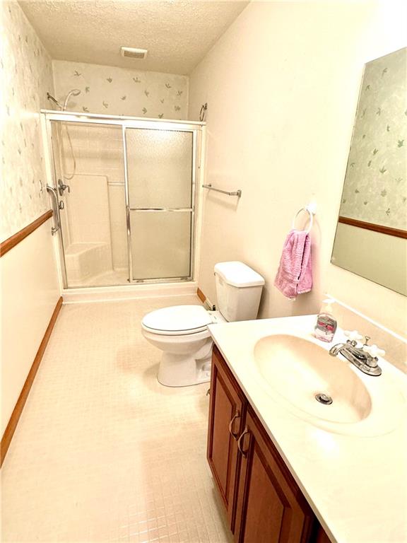 569 Whitestown Road Butler, PA 16001 - Photo 26 of 47 a bathroom with a sink and a mirror