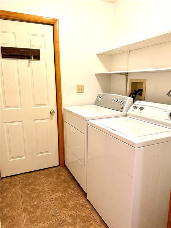 569 Whitestown Road Butler, PA 16001 - Photo 27 of 47 a utility room with dryer and washer