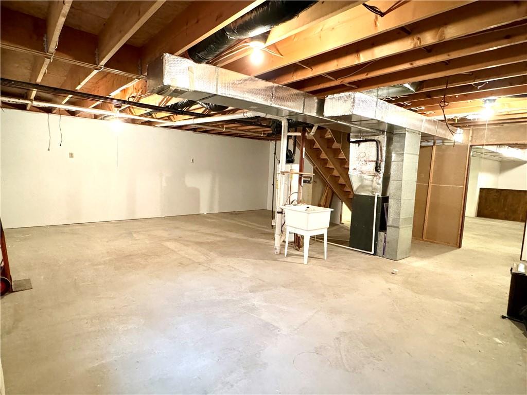 569 Whitestown Road Butler, PA 16001 - Photo 39 of 47 a view of an empty room with a chair