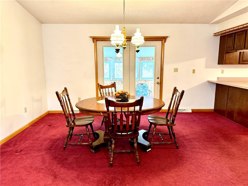 569 Whitestown Road Butler, PA 16001 - Photo 10 of 47 a dining room with furniture and window