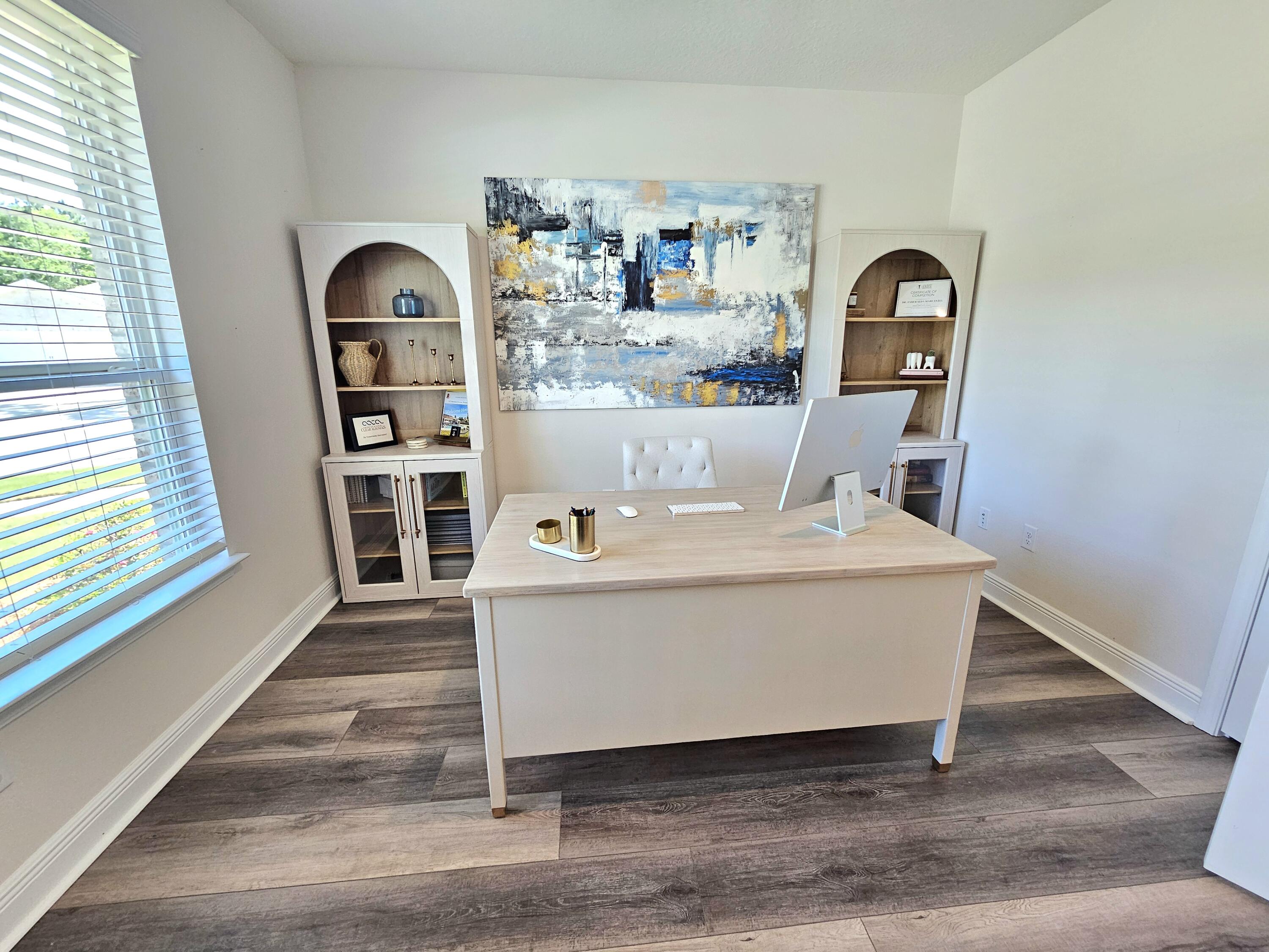 137 Autumn Avenue Freeport, FL 32439 - Photo 22 of 57 a living room with hard wood flooring and a couch