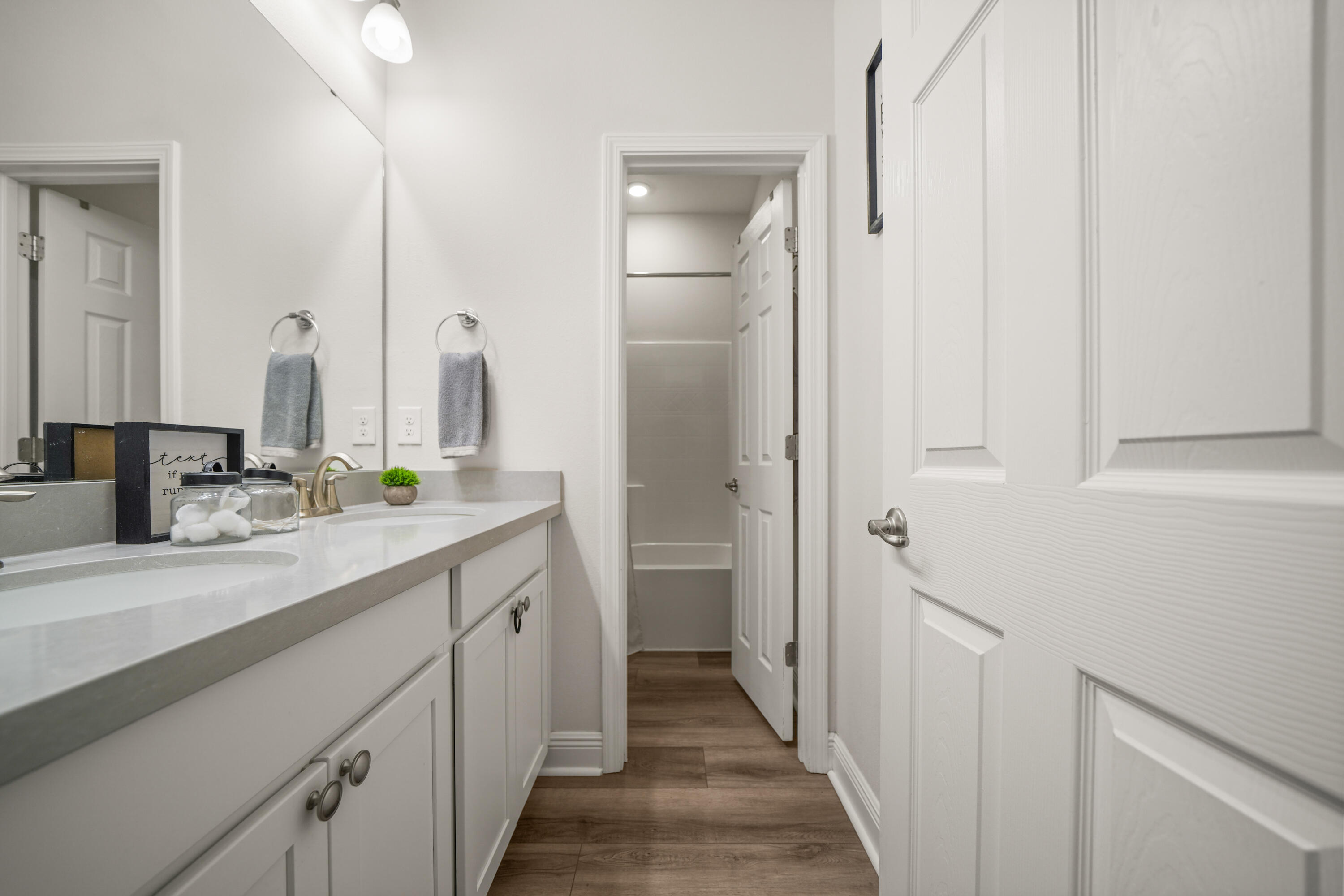 137 Autumn Avenue Freeport, FL 32439 - Photo 41 of 57 a bathroom with a double vanity sink and a mirror