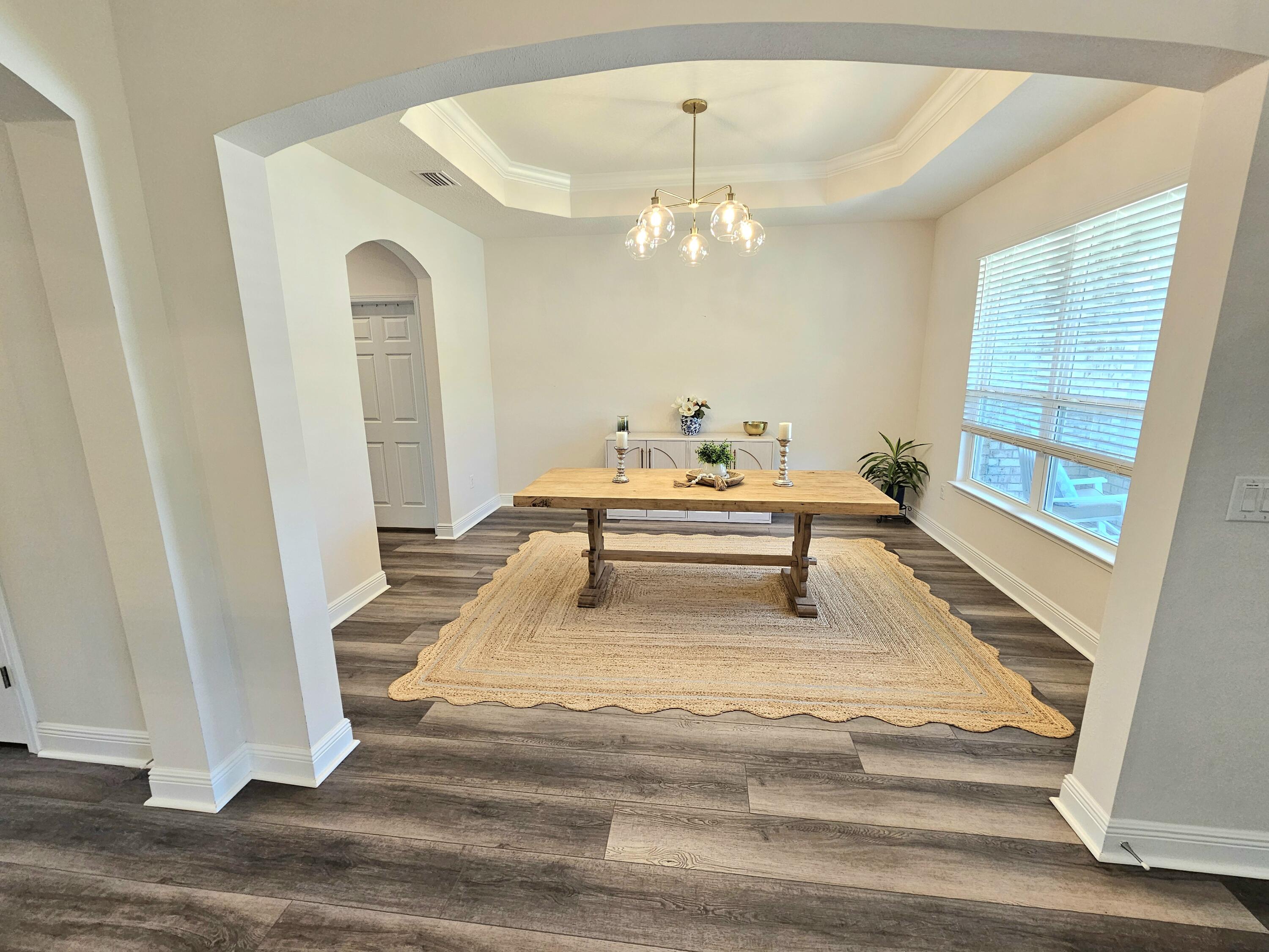 137 Autumn Avenue Freeport, FL 32439 - Photo 7 of 57 Arched Ceiling & Formal Dining _ Living