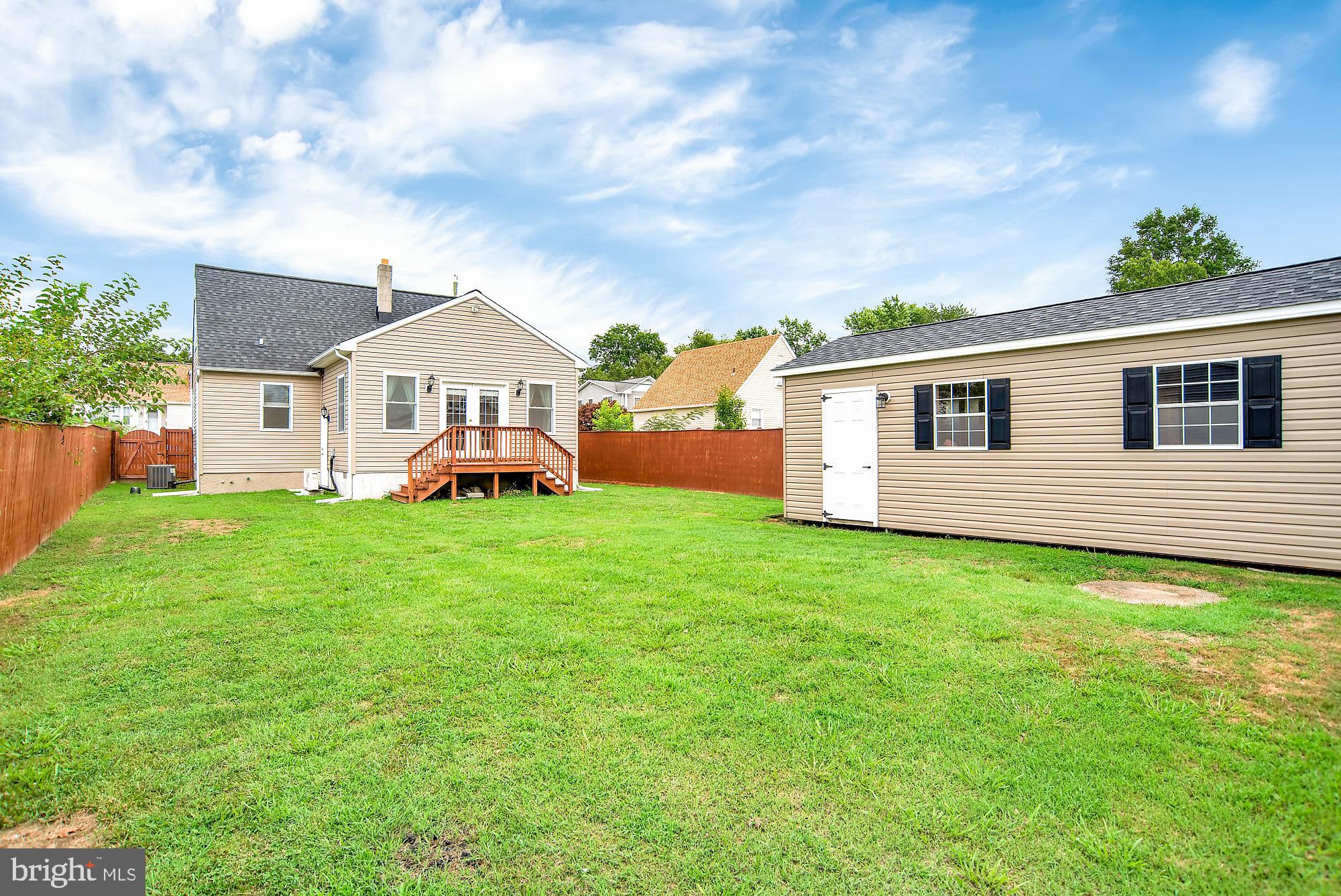 8448 Garden Road Pasadena, MD 21122 - Photo 24 of 27 Large backyard with shed