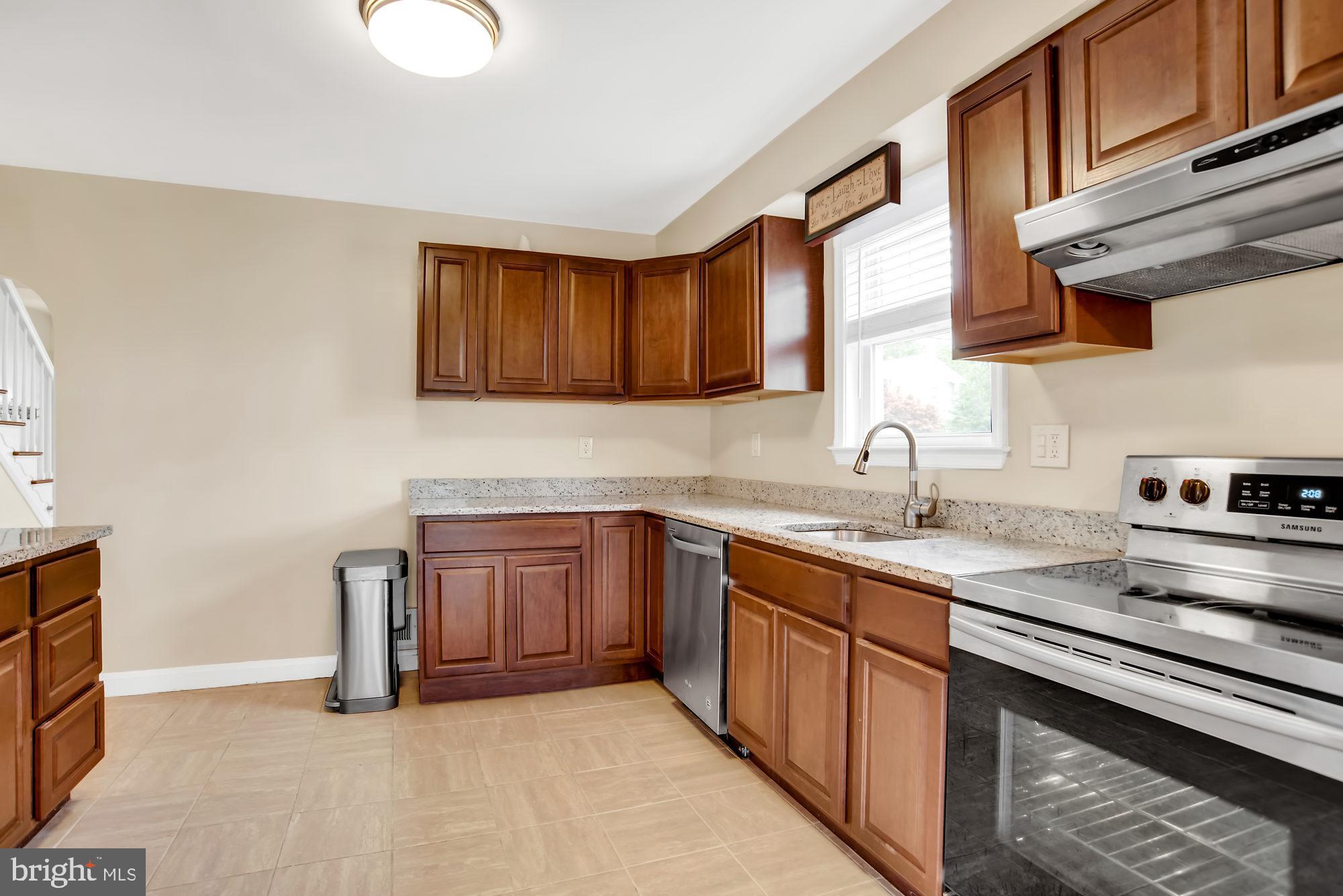 8448 Garden Road Pasadena, MD 21122 - Photo 8 of 27 Kitchen with granite counters