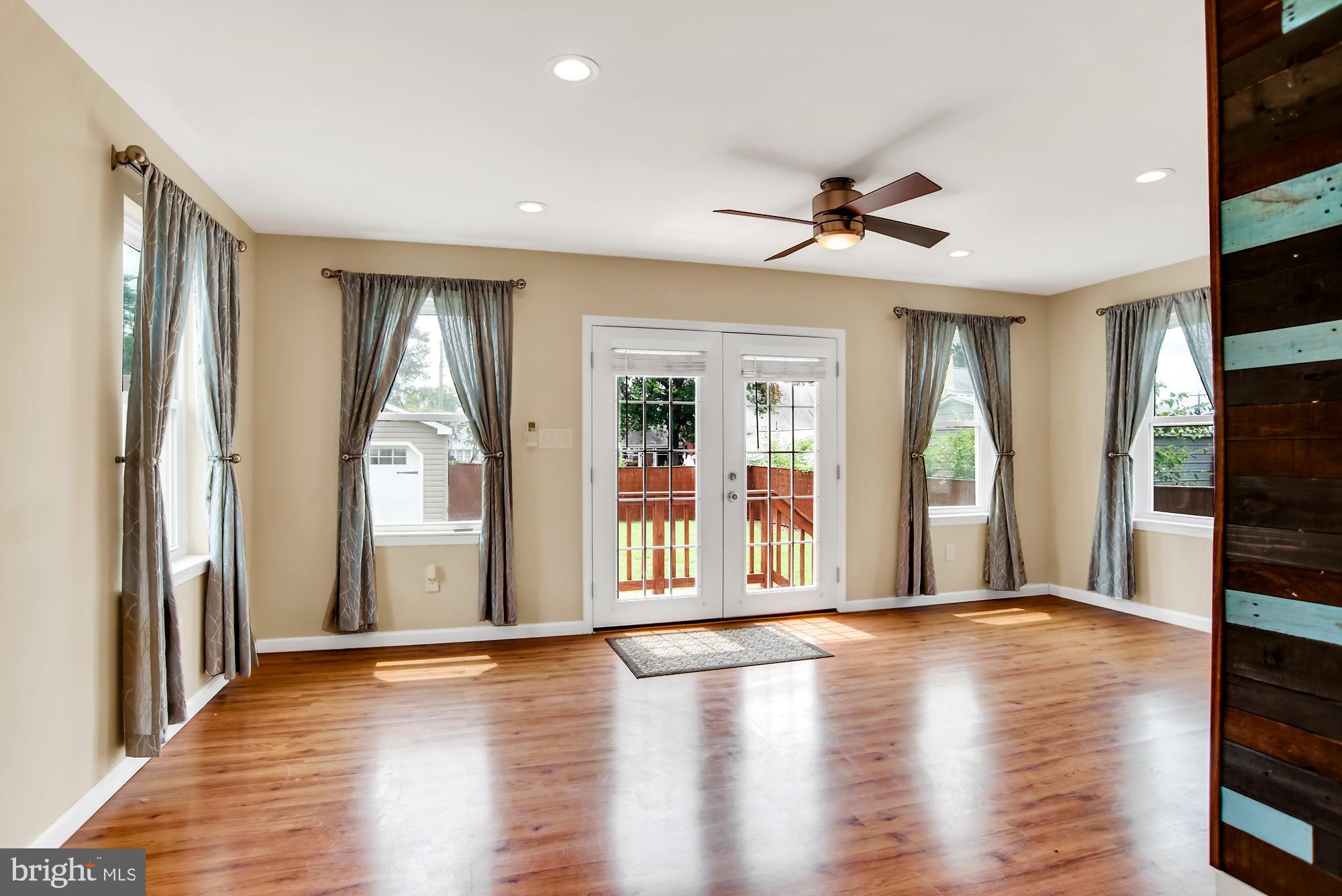 8448 Garden Road Pasadena, MD 21122 - Photo 9 of 27 Main level family room addition