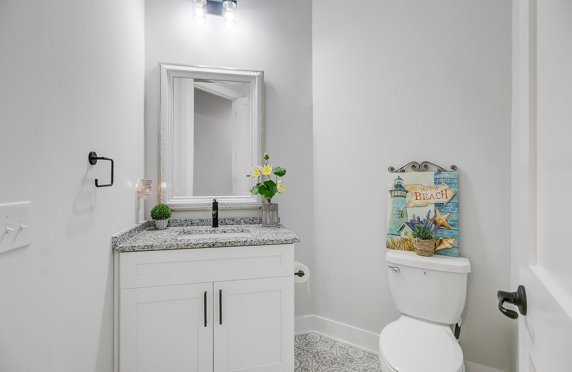 614 Cummings Chapel Road Ridgeville, SC 29472 - Photo 48 of 68 49. Powder room off of the kitchen
