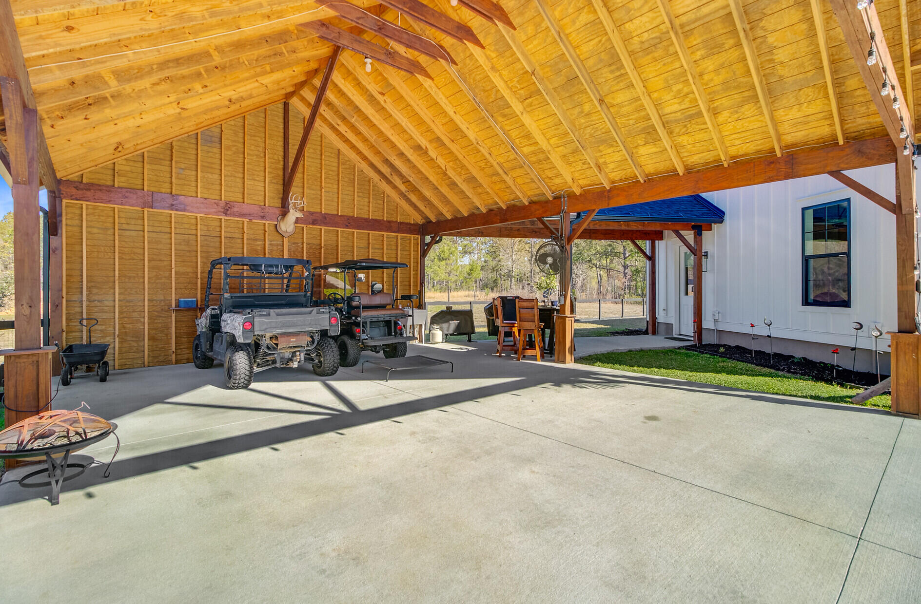 614 Cummings Chapel Road Ridgeville, SC 29472 - Photo 62 of 68 63. Versatile carport to host lowcountr