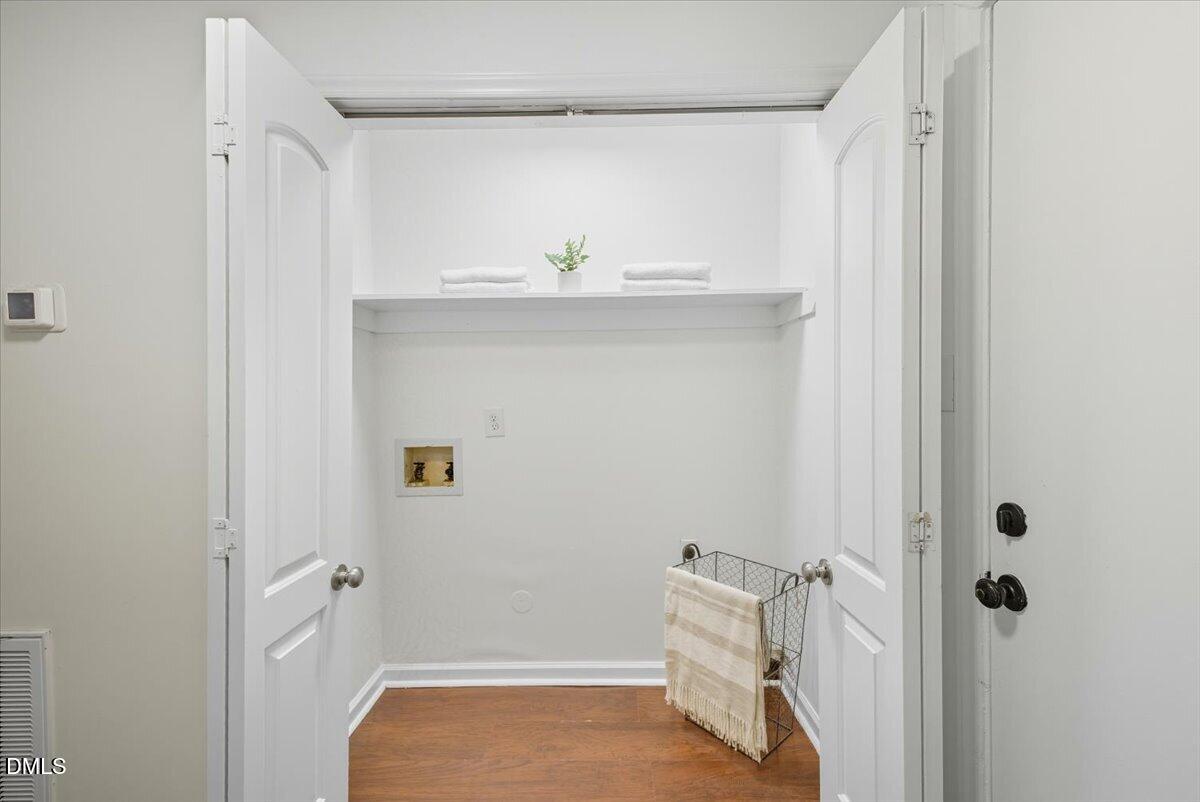 102 Choptank Court, Unit A2 Cary, NC 27513 - Photo 4 of 24 a bathroom with a bathtub and shower