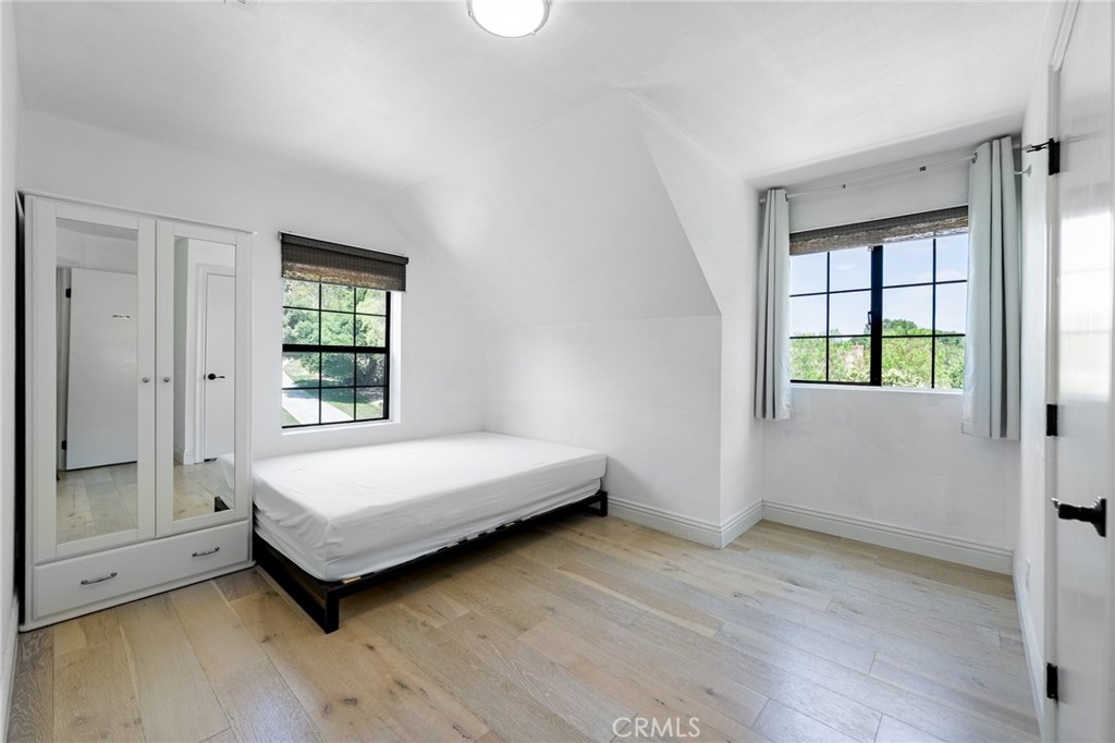 15601 Saddleback Road Canyon Country, CA 91387 - Photo 29 of 55 a spacious bedroom with a bed and a window