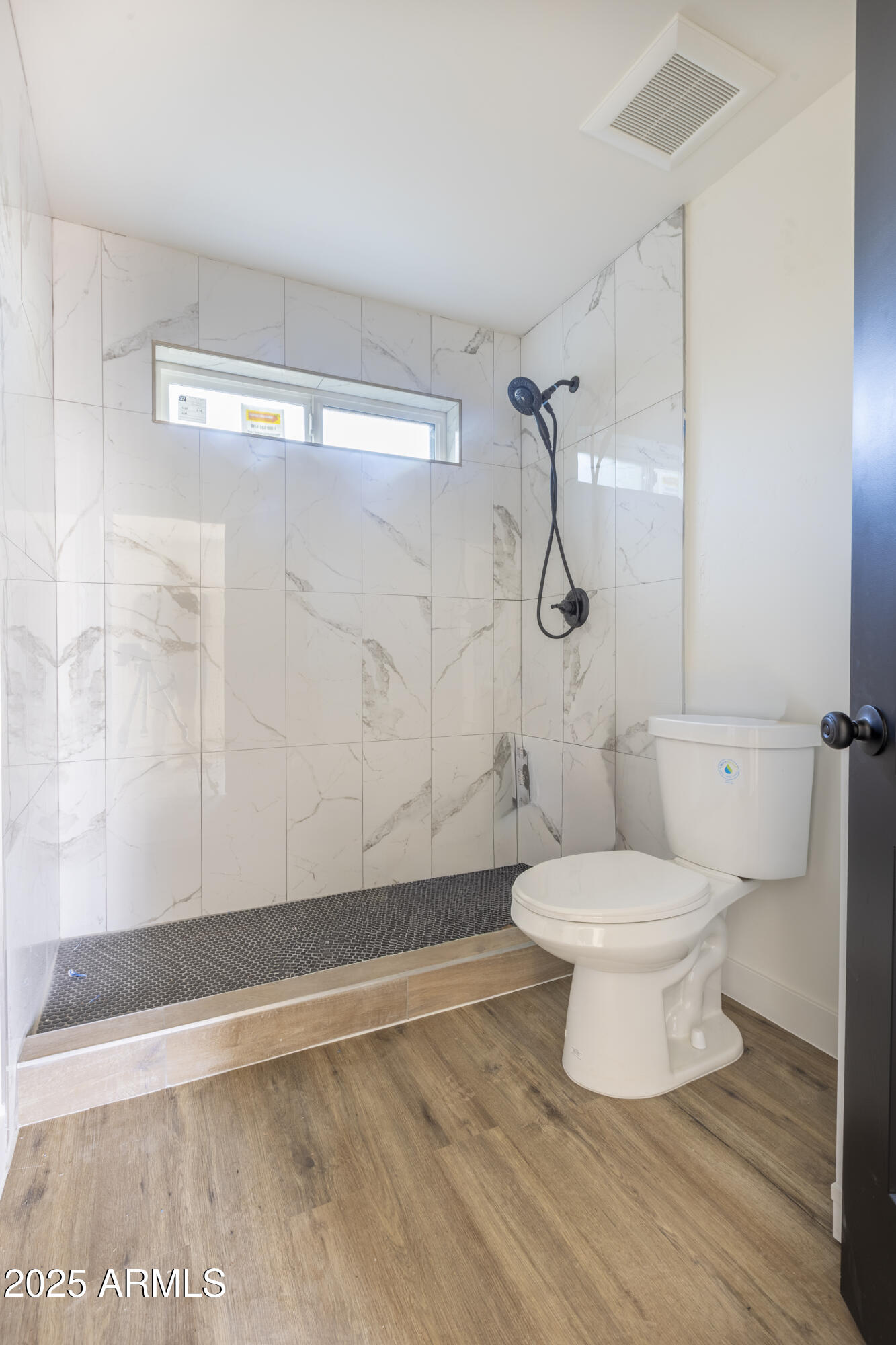 1324 East Hall Street Tempe, AZ 85281 - Photo 22 of 25 a bathroom with a toilet and a shower