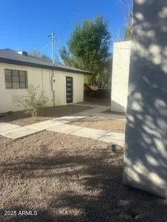 a view of backyard of the house