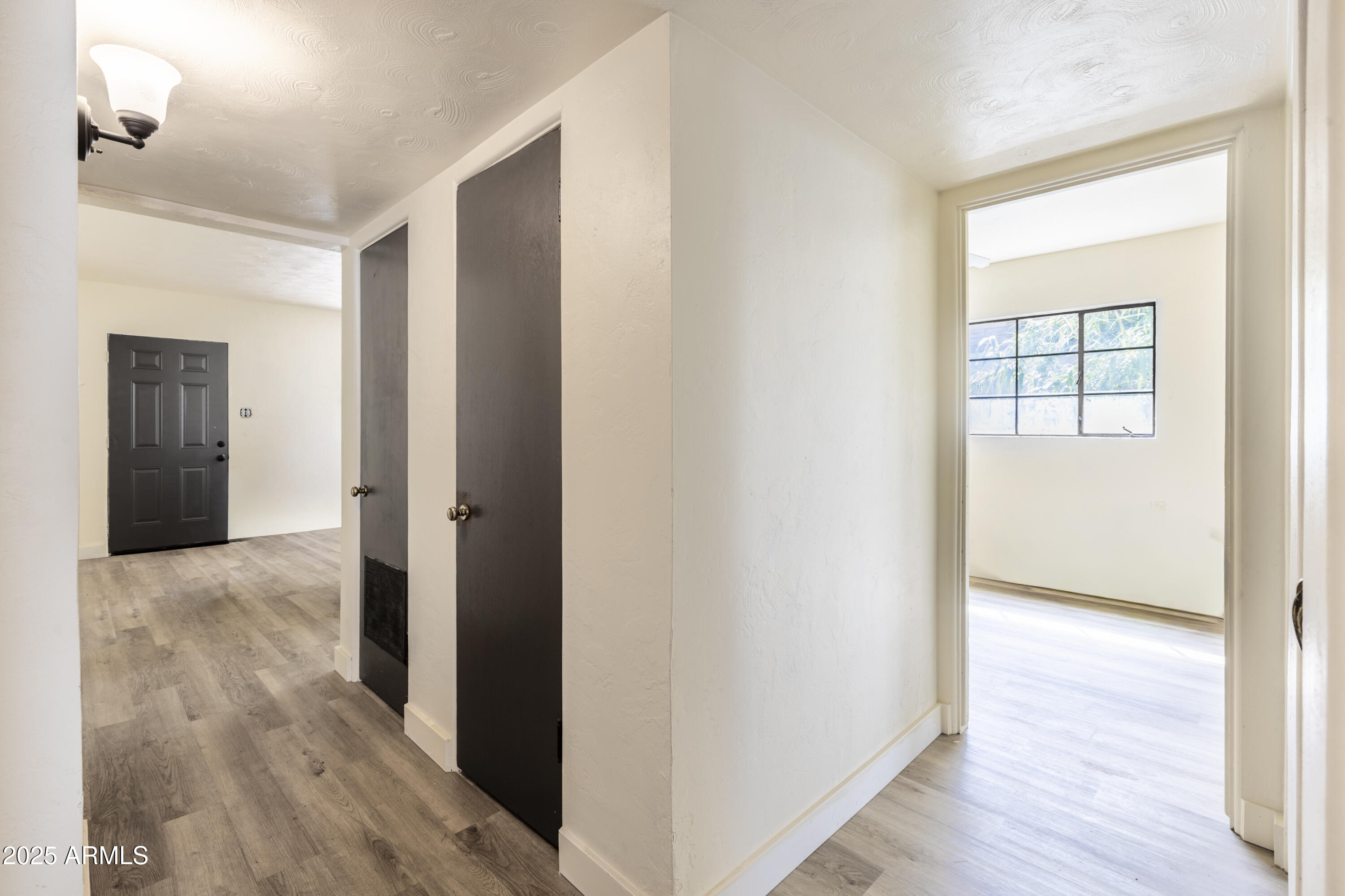 1324 East Hall Street Tempe, AZ 85281 - Photo 4 of 25 a view of hallway with wooden floor