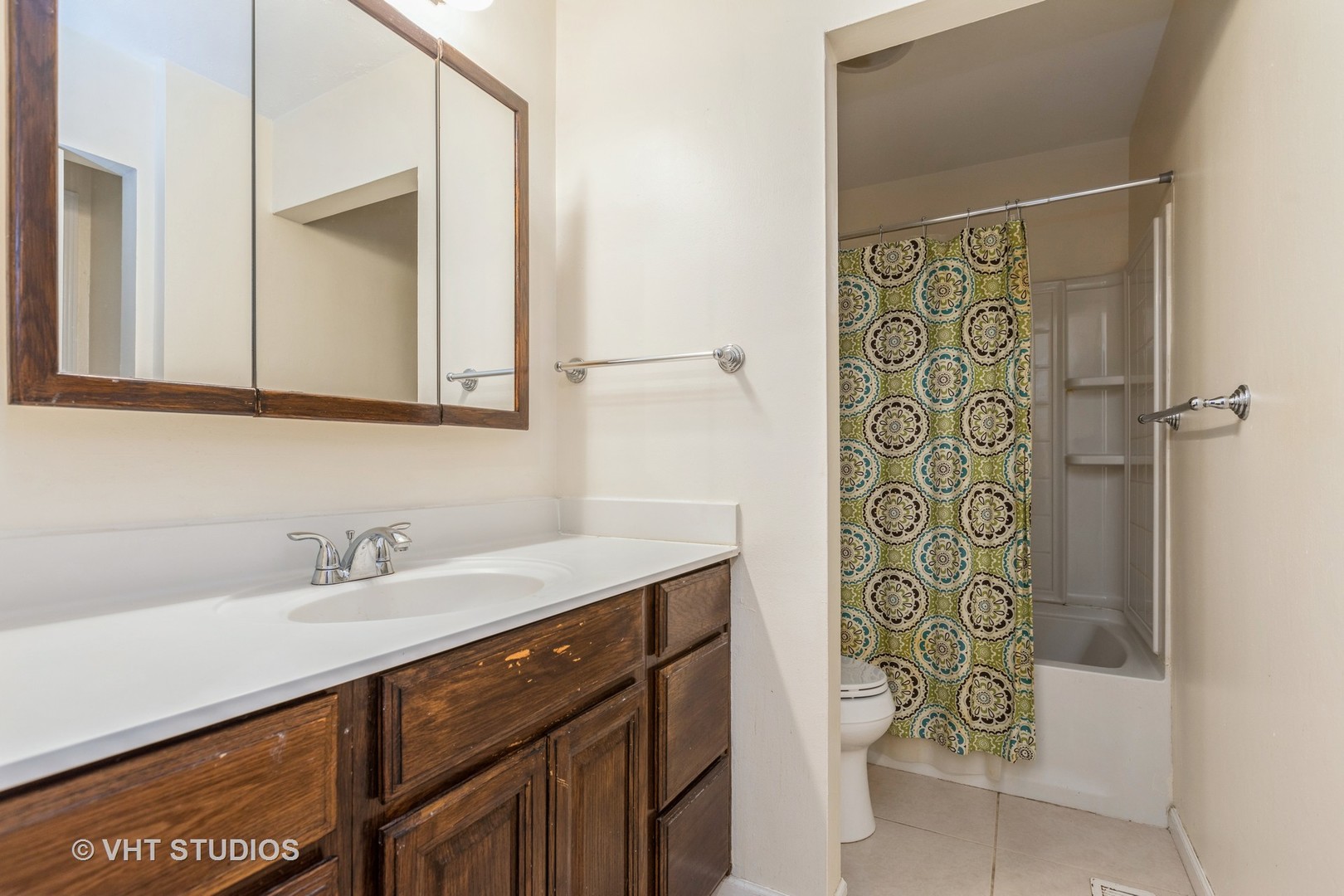 54 Oak Valley Drive Cary, IL 60013 - Photo 11 of 17 a bathroom with a sink and a mirror