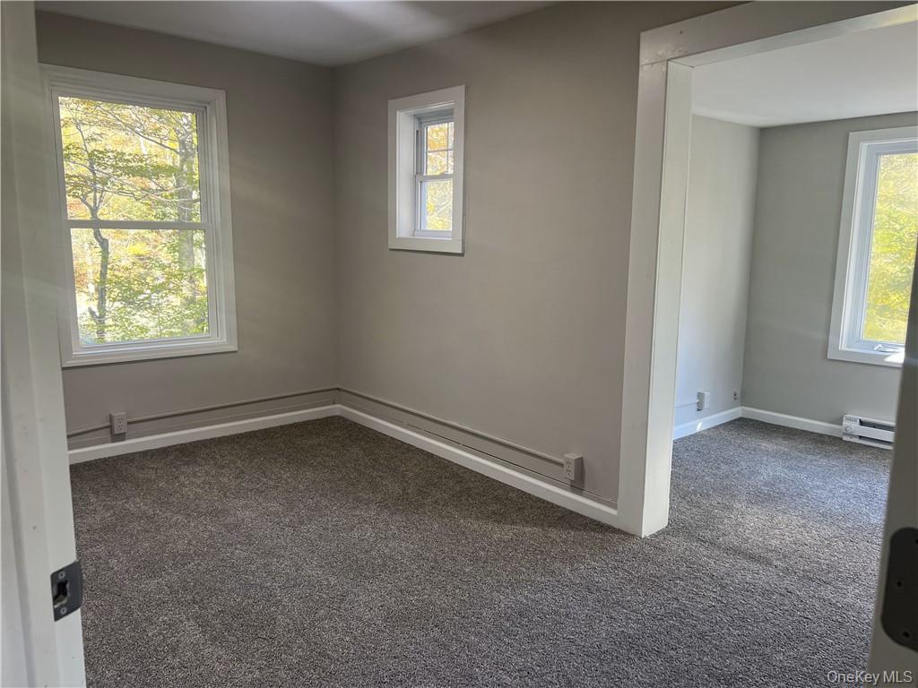 270 Benton Hollow Road Neversink, NY 12765 - Photo 12 of 21 an empty room with a window