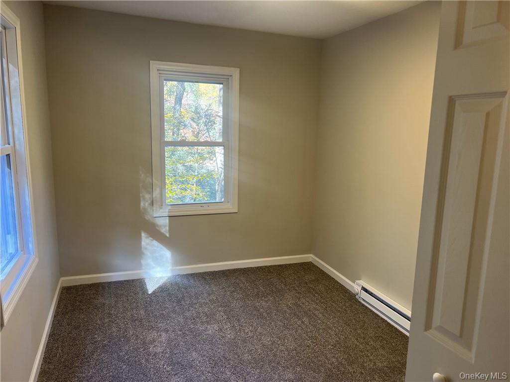 270 Benton Hollow Road Neversink, NY 12765 - Photo 15 of 21 an empty room with a window