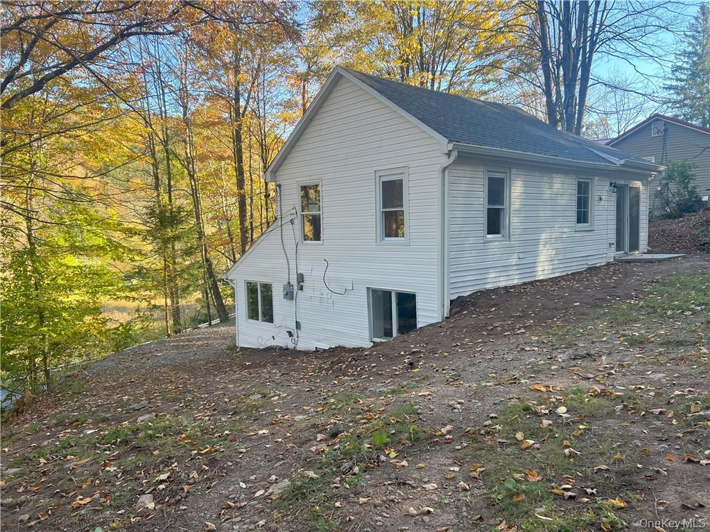 270 Benton Hollow Road Neversink, NY 12765 - Photo 19 of 21 a view of a house with a yard