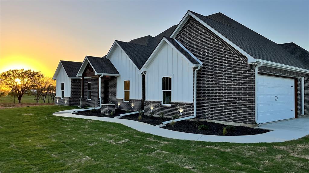 1290 County Road 2175 Decatur, TX 76234 - Photo 1 of 1 a front view of house with yard and green space