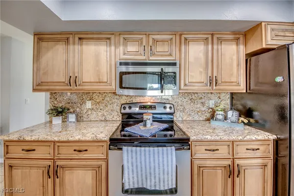 a view of a hallway with seating area