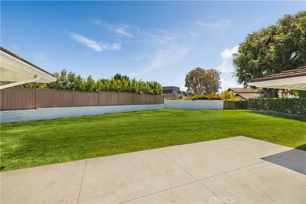 a view of backyard with green space