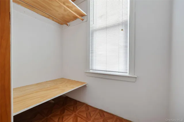 a view of a room with a window