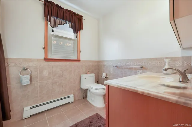 a bathroom with a sink and a toilet