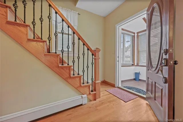 a view of an entryway with staircase