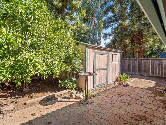 a backyard of a house with lots of green space