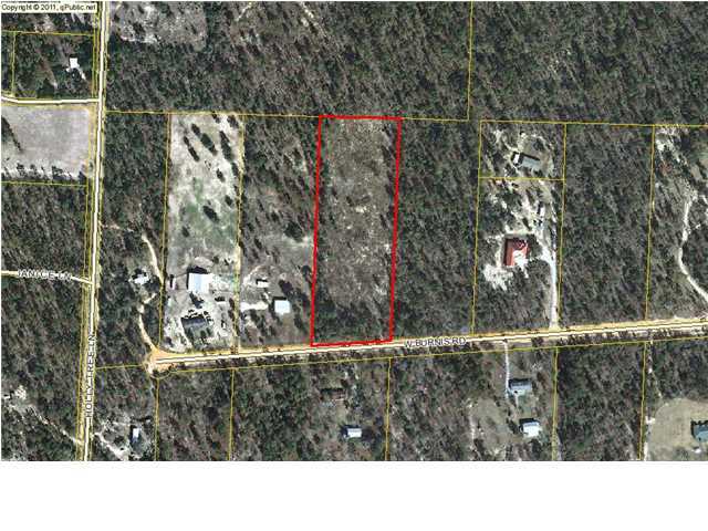 5.34-ac 5.34-ac Burnis Road Crestview, FL 32539 - Photo 1 of 5 a black and white photo of a house