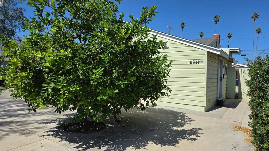 19843 Enadia Way Winnetka, CA 91306 - Photo 12 of 20 a view of a house with a tree