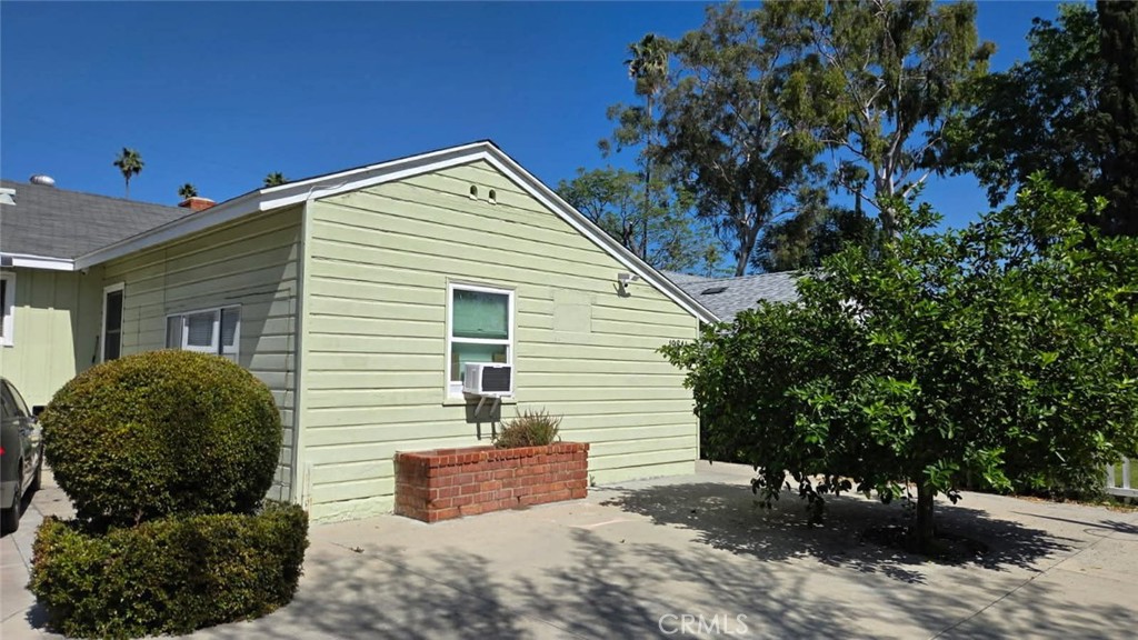 19843 Enadia Way Winnetka, CA 91306 - Photo 9 of 20 a view of a house with a backyard