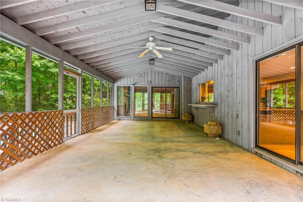 4200 Clinard Road Clemmons, NC 27012 - Photo 20 of 49 Large screened in covered porch off of family room and sunroom