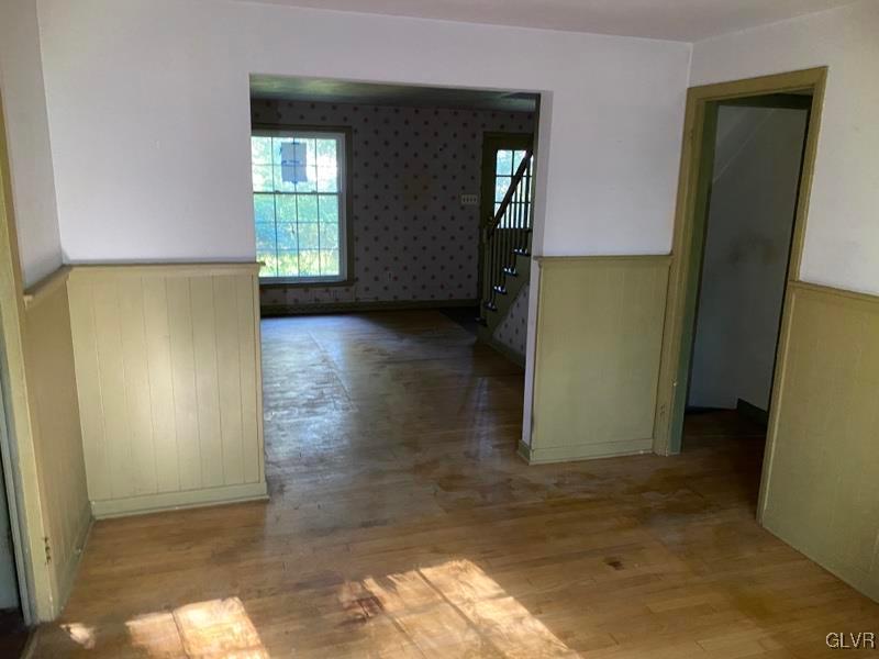 1029 Westgate Circle Bethlehem, PA 18017 - Photo 16 of 42 an empty room with wooden floor and windows