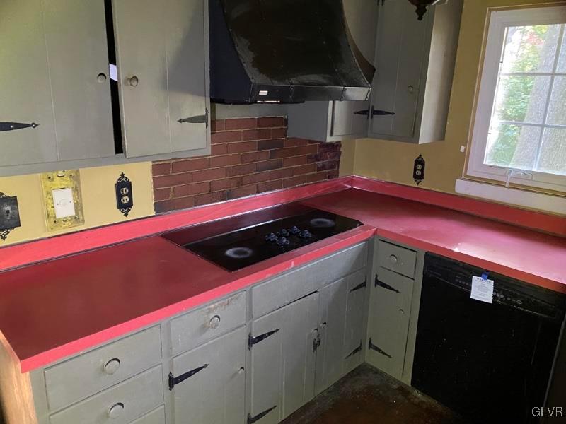 1029 Westgate Circle Bethlehem, PA 18017 - Photo 17 of 42 a kitchen with a sink a stove and cabinets