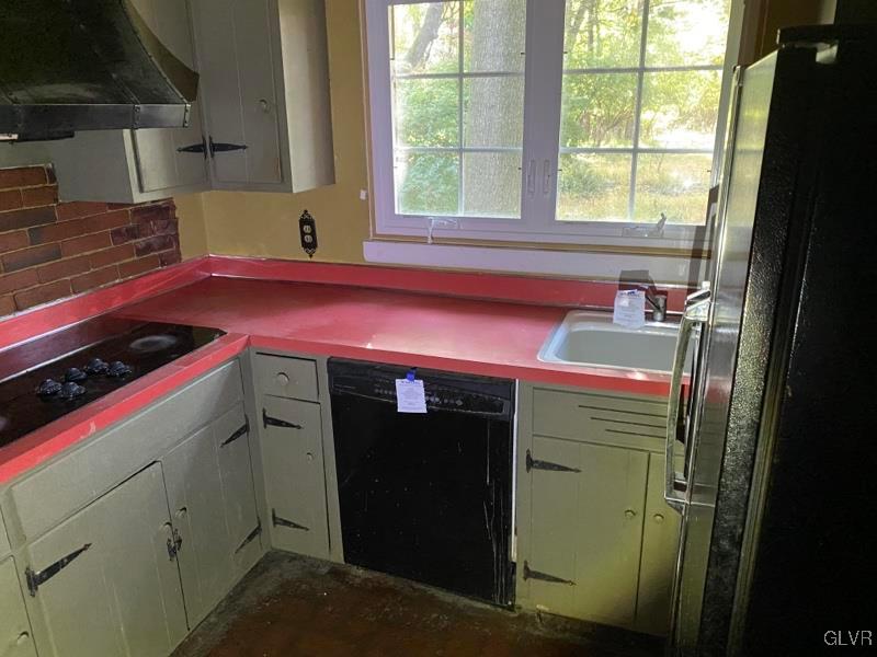 1029 Westgate Circle Bethlehem, PA 18017 - Photo 18 of 42 a kitchen with a sink cabinets and window
