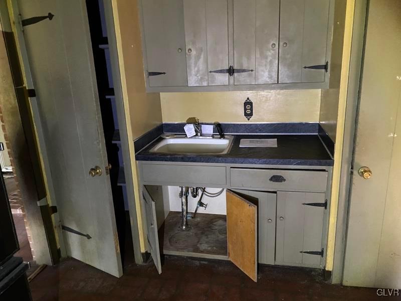 1029 Westgate Circle Bethlehem, PA 18017 - Photo 20 of 42 a kitchen with a refrigerator and cabinets