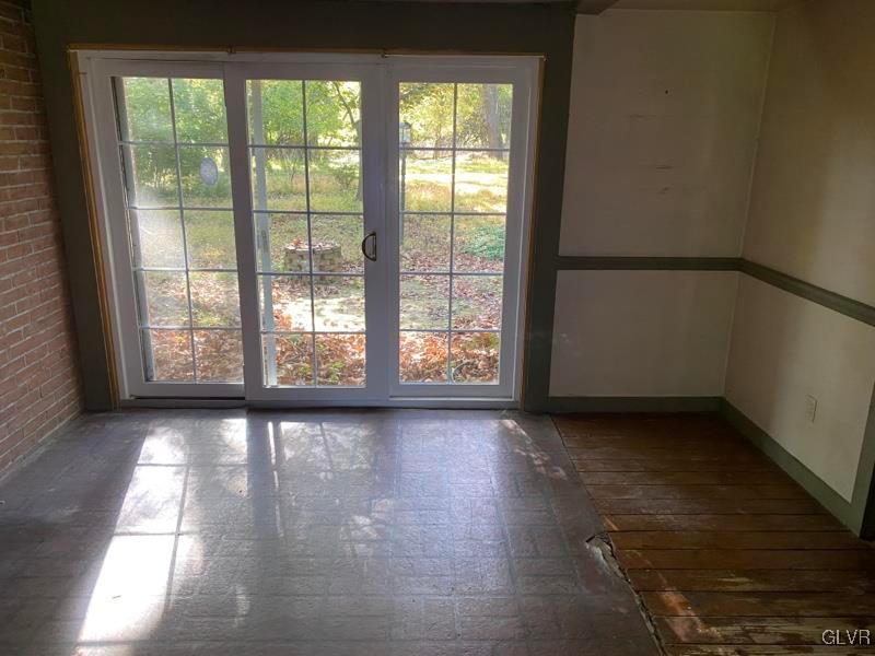1029 Westgate Circle Bethlehem, PA 18017 - Photo 21 of 42 an empty room with wooden floor and windows