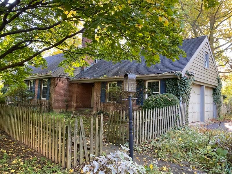 1029 Westgate Circle Bethlehem, PA 18017 - Photo 3 of 42 a front view of a house with a garden
