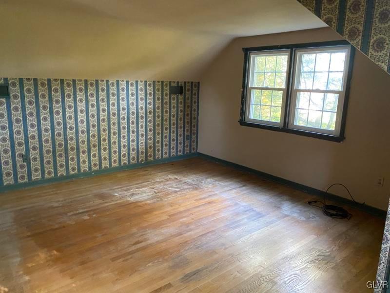 1029 Westgate Circle Bethlehem, PA 18017 - Photo 33 of 42 an empty room with wooden floor and windows