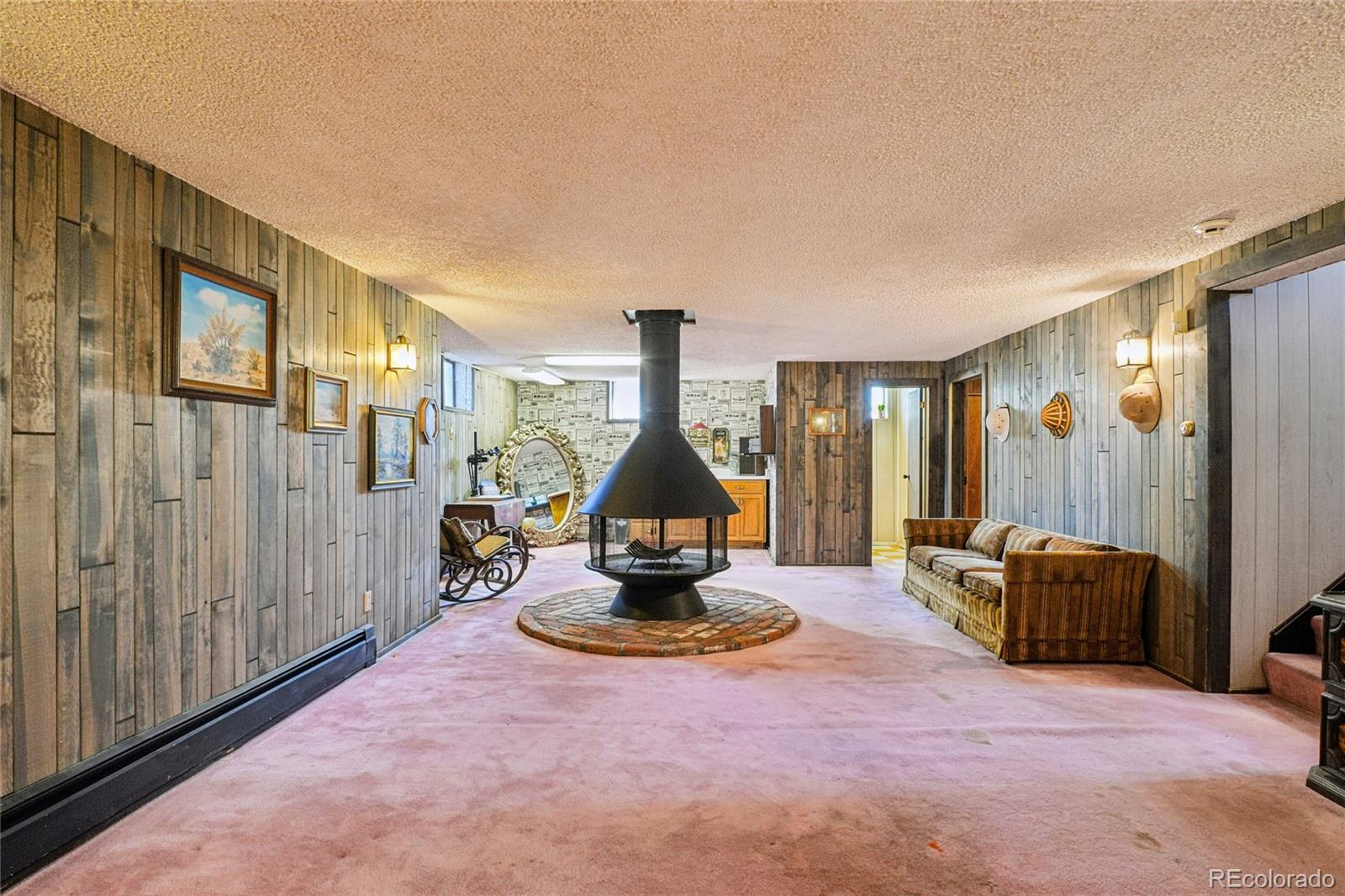 6920 West 47th Place Wheat Ridge, CO 80033 - Photo 23 of 43 a living room with furniture