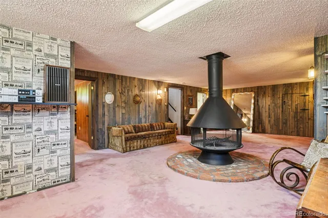 a view of a lobby with furniture and a floor to ceiling window