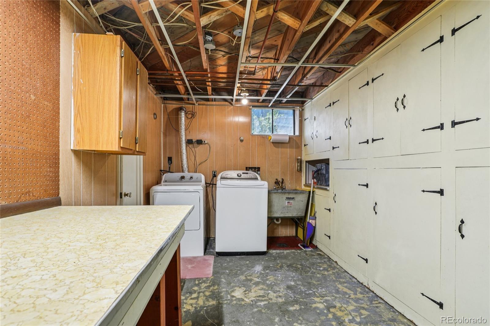 6920 West 47th Place Wheat Ridge, CO 80033 - Photo 34 of 43 a utility room with dryer and washer