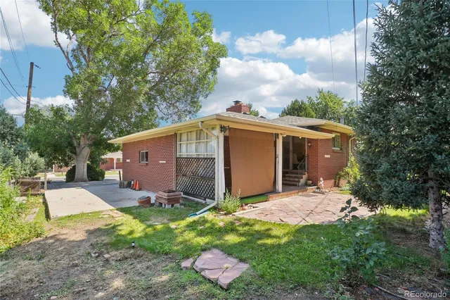 a backyard of a house with lots of green space
