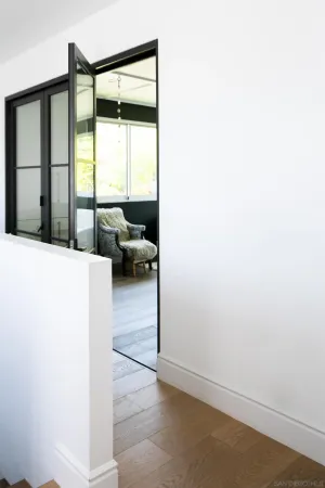 a view of a living room hardwood and a balcony