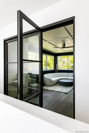 a view of a living room and window