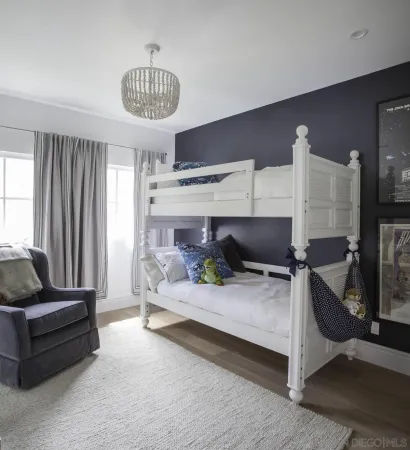 a bedroom with bed and window