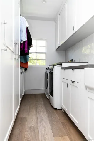 a view of a storage & utility room with a window